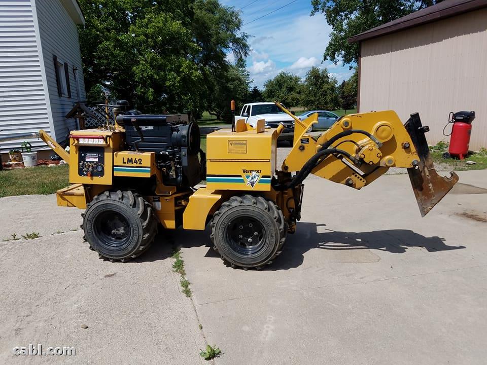 2001 Vermeer LM42 Drop Plow with Bore Attachment.