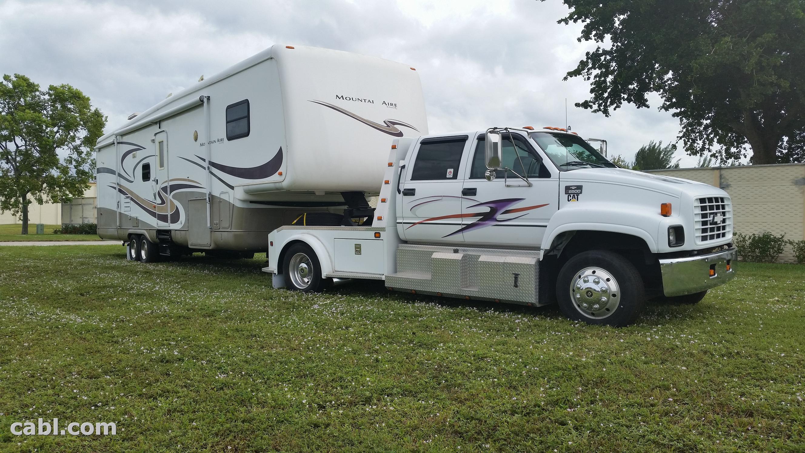 5th Wheel Trailer w/C6500 Diesel Truck Furnished