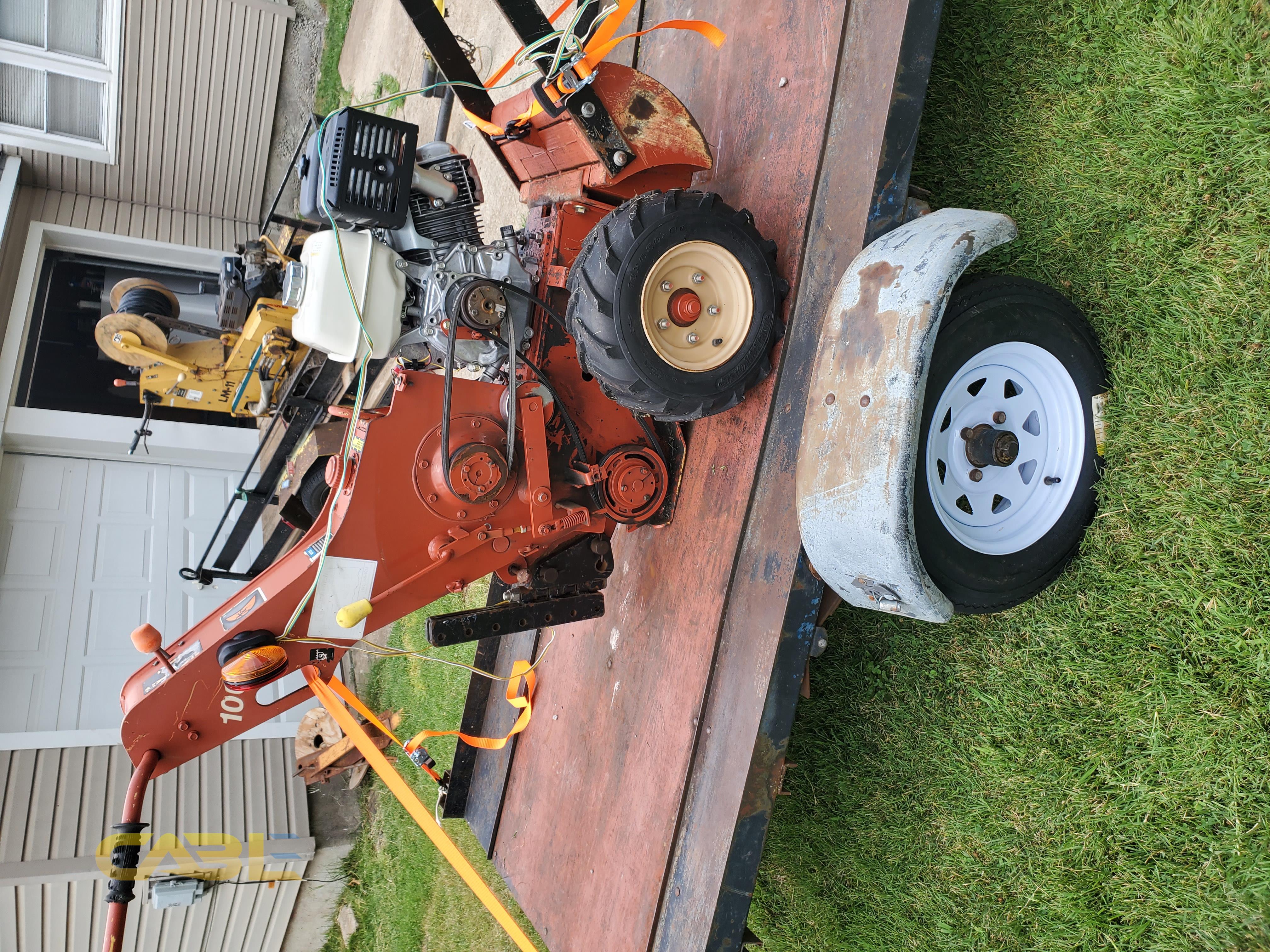 Pictures (Ditch Witch 100sx with burying capability)
